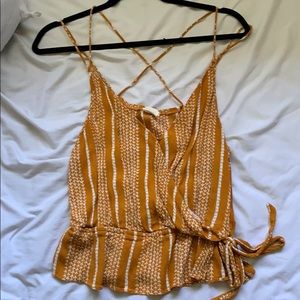 A mustard&white patterned strappy tank